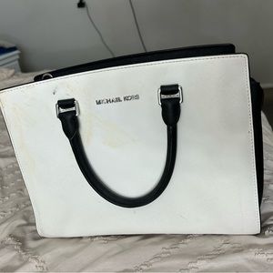 Michael Kors bag, black and white with stain on front